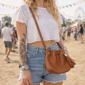 MICHAEL Michael Kors Brown Mini Drawstring Crossbody Tassel Bag